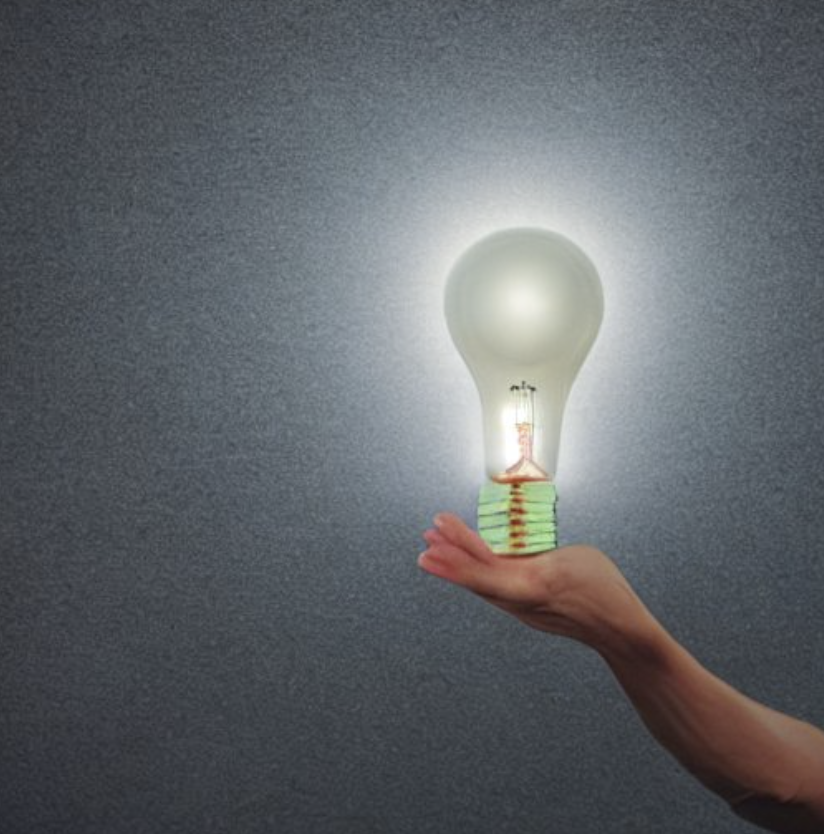 entrepreneur holding lightbulb